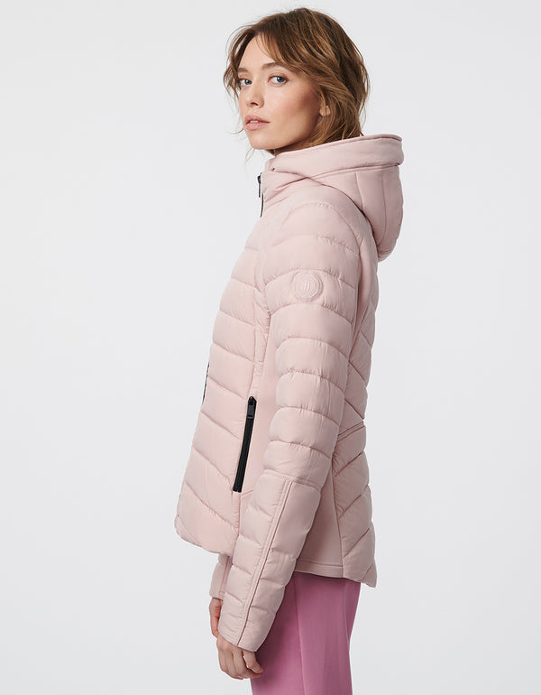 womens water resistant hip length puffer in pastel pink a spring wardrobe staple