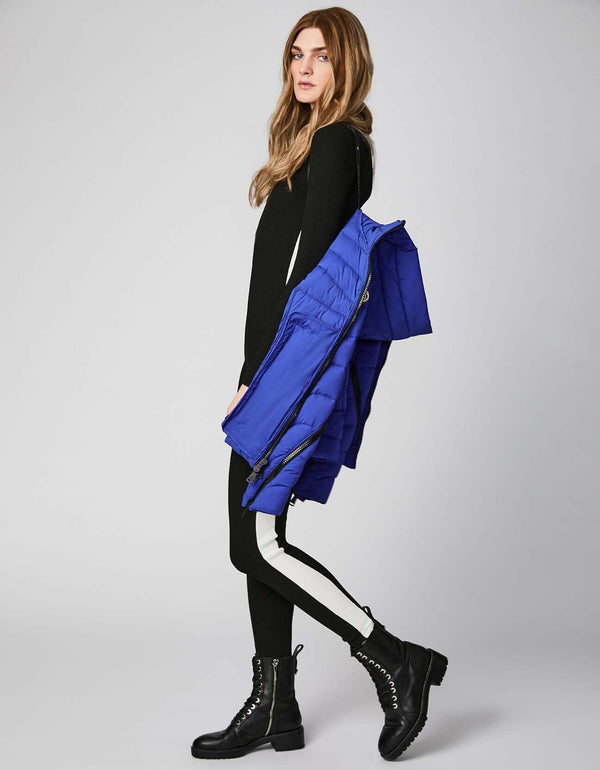 side shot of a blue zip around jacket with a sustainable style made from Bernardo outerwear