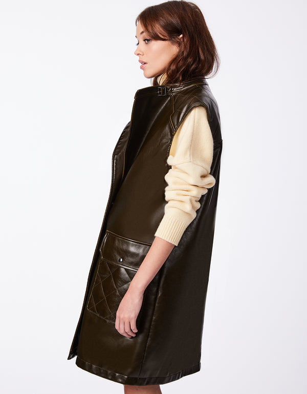 modern and stylish womens outerwear vest in dark brown made of vegan leather with belt buckle neck tab and snap front