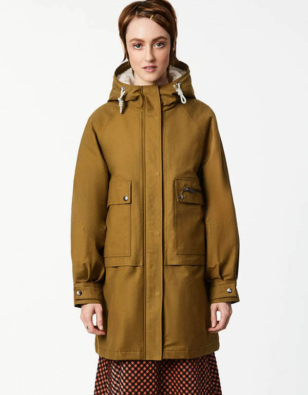 chic cargo parka with faux fur trim is made from cotton and polyester perfect for the eco conscious fashionista