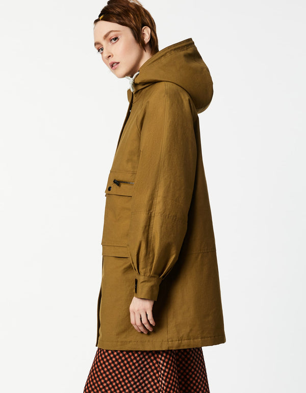 versatile cargo parka with a Sherpa lined hood and other utilatarian elements