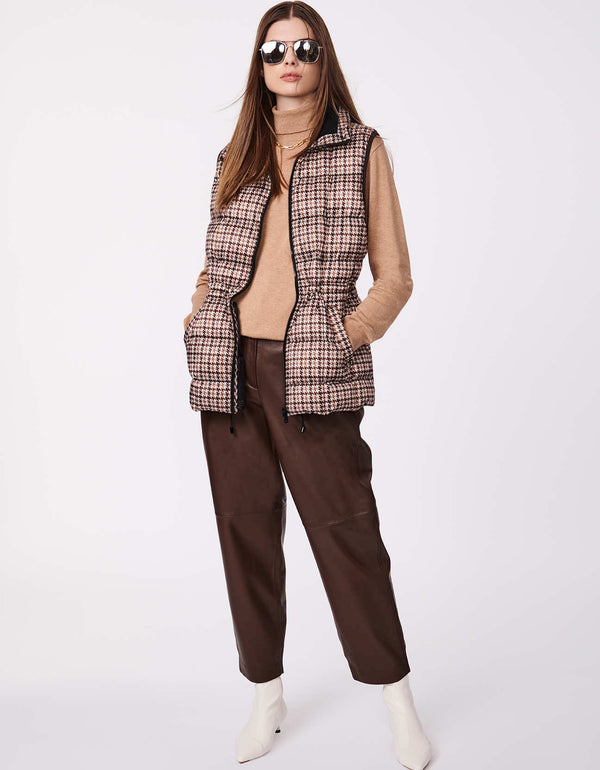 classic fit hip length womens puffer vest in brown with welted pockets keep your hands warm