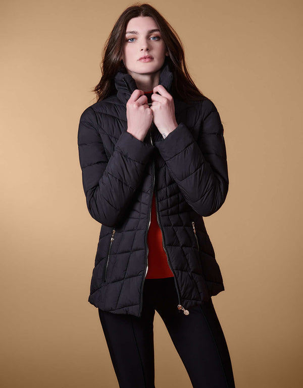 semi fitted puffer jacket for women in black color with flared silhouette to help draw eyes away from the waist