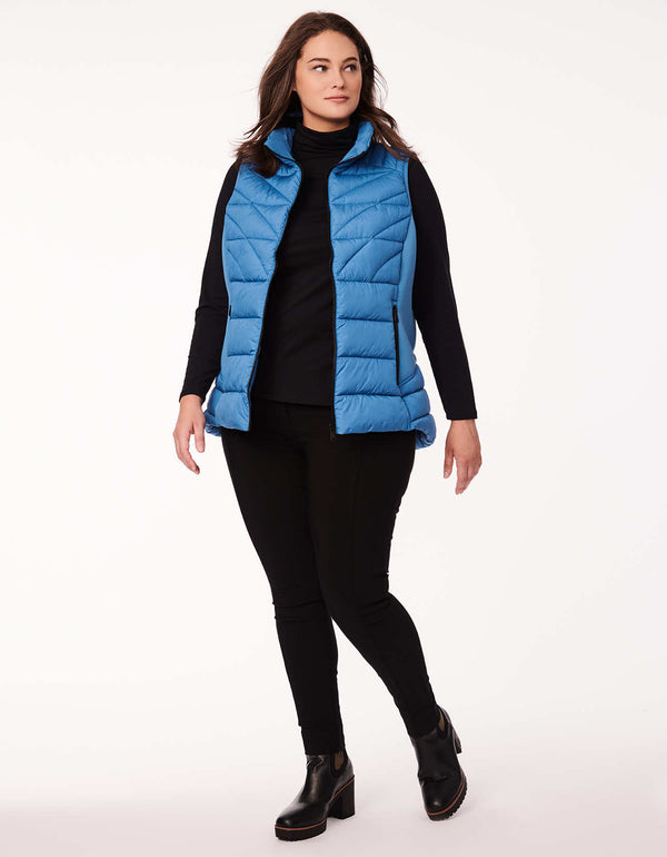 plus sized womens outerwear vest in color blue with neoprene side panels and flattering quilted pattern