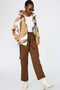 oversize hooded shell jacket for versatile protection in abstract windward design