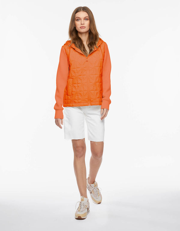 quilted orange puffer jacket for women for lightweight layering during spring season crafted with sustainable filler for superior warmth