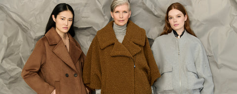 Three stylish ladies wearing women's outerwear from Bernardo Fashions. 