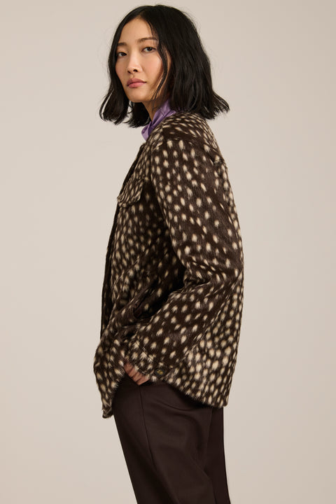 Bambi print faux calf hair utility jacket with collarless silhouette, flap pockets and relaxed fit.