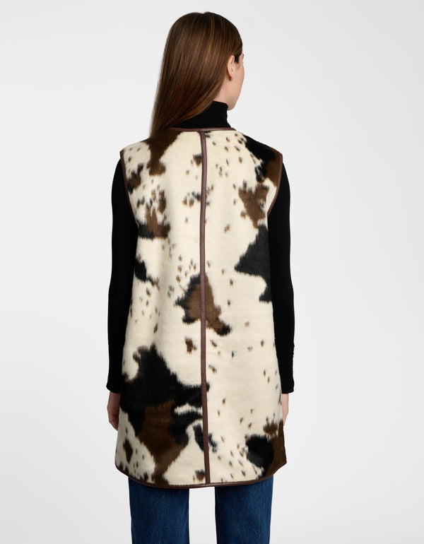 The back of a Dakota Cow Print Long Vest for women.