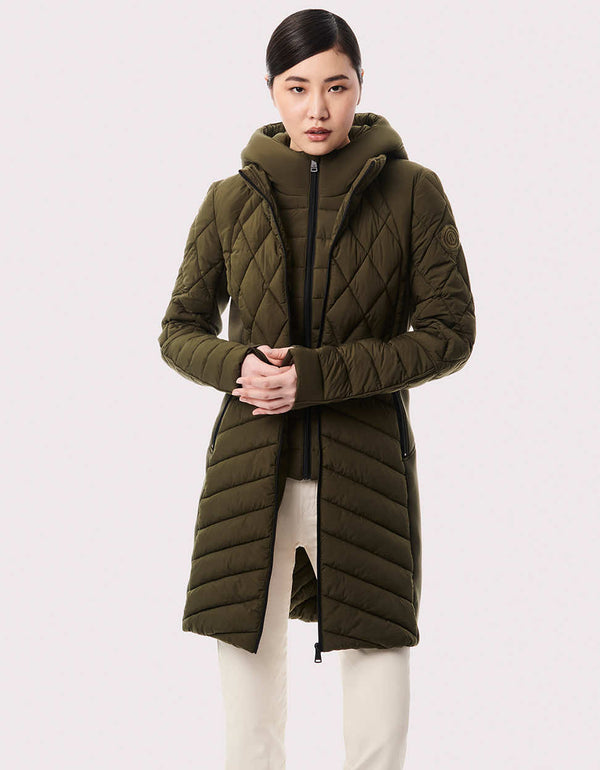 cruelty free puffer jacket for women that is machine wash safe and has a zip out vest design