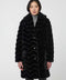 oversized vegan fur coat with tonal zigzag seams and angled hand pockets mid length design