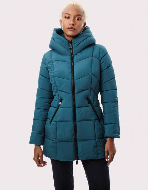 womens astro green puffer outerwear that is insulated with post consumer plastic bottles that warms without bulk 