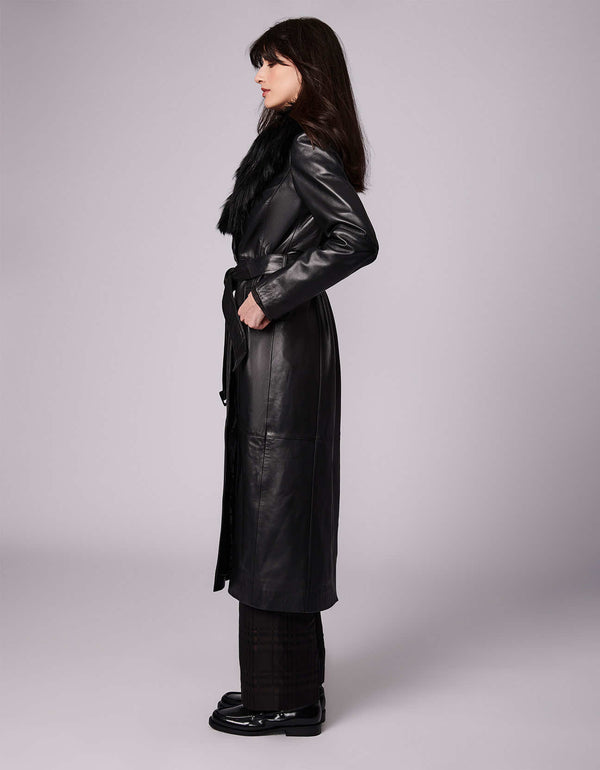 side shot of a multiple styling black fur leather coat with a classic fit and below the knee length