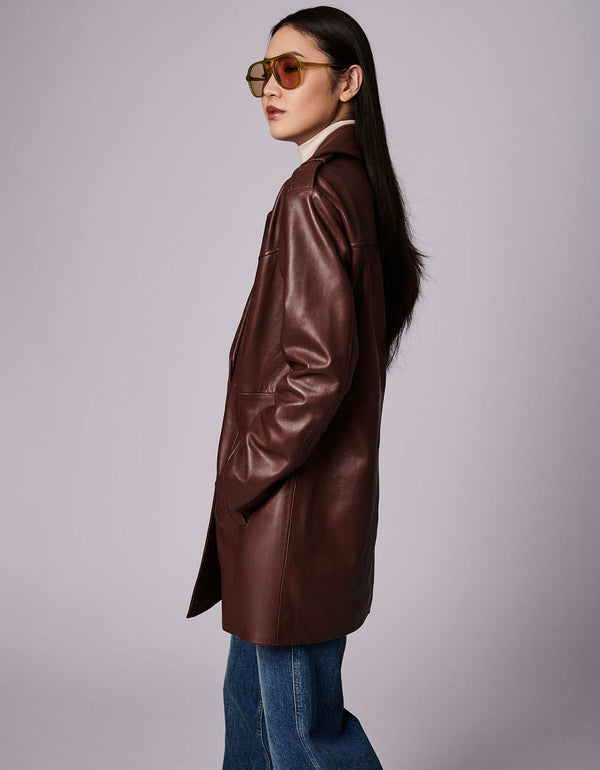 wood colored leather outerwear with added length and outstanding lapel design that will accentuate shoulders