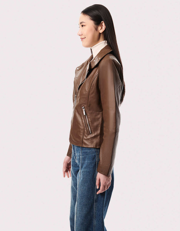 Our women’s moto jacket is classically tailored in soft genuine leather. Designed for layering and transitional weather for fall and early winter.
