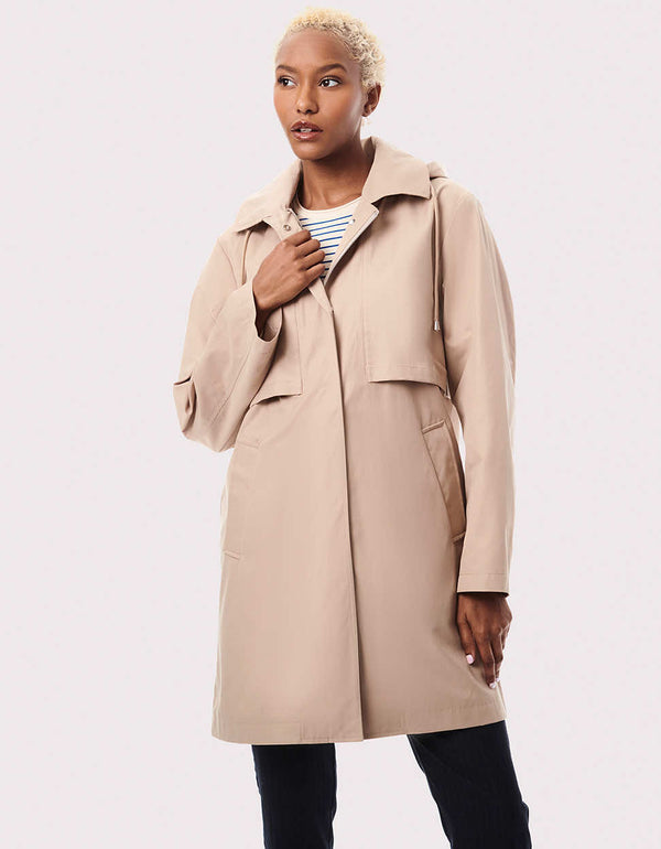 A classic rain coat for women has a zip-off hood for versatile ways to wear it.