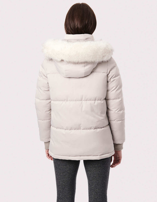 winter running jackets for women with faux fur collar and plush hood made from sustainable materials