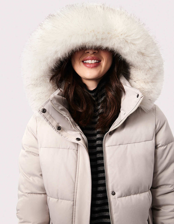 best light winter jacket for women during holiday season with faux fur lining that makes it warmer
