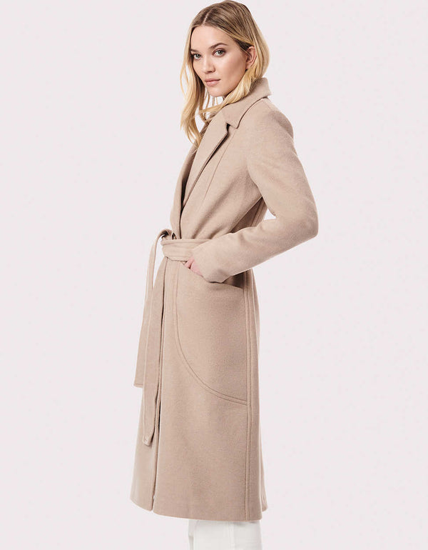 light brown below the knee length wool polyester blend outercoat that is streamlined to focus on the curves and height