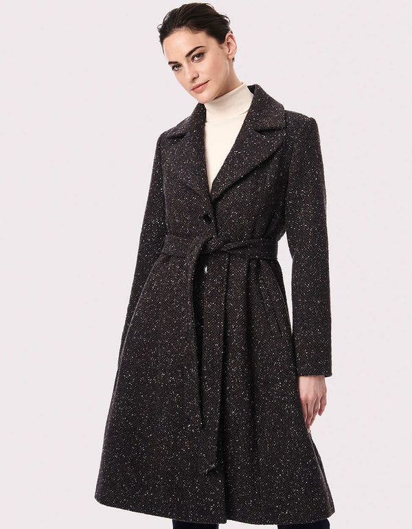 women shopping for outerwear this season should consider this knee length belted coat made in a soft wool blend