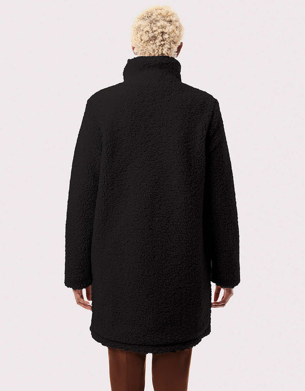 faux fur coat in classic mid length fit in black color that gives warmth through fall to winter