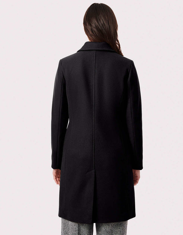 chic executive parisian old money style coat that highlights the womens curves front and back