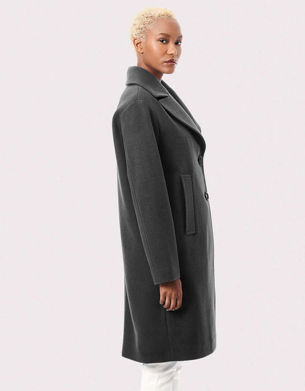 professional wool coat with a traditional lapel and hand pockets to complete the coat for the desk to dinner look