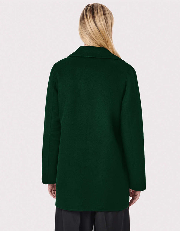 a back shot of a mid length dark green timeless jacket that can act as a center or side piece for a perfect outfit