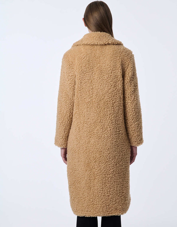 warm oversized womens coat made with a smooth thick texture and elongated cut for added coverage