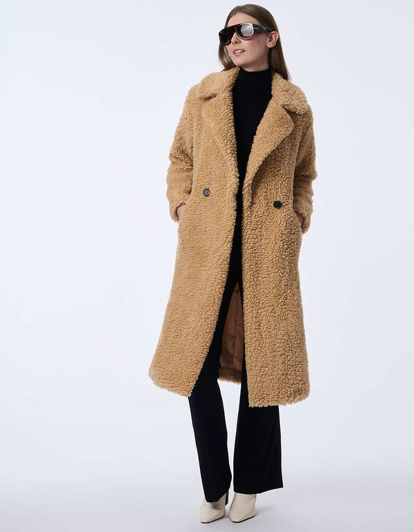 trendy ginger root faux fur coat designed with a longline silhouette and teddy texture for stylish warmth