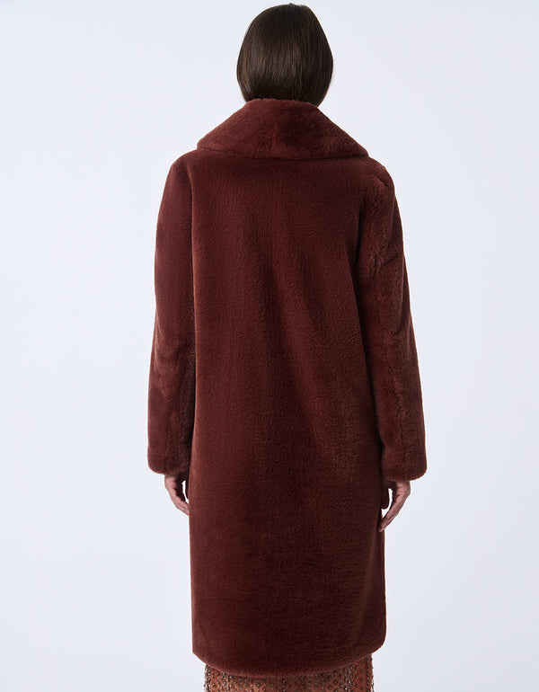 Women's long faux fur coat for an elevated look. Soft plush warmth for day or night.