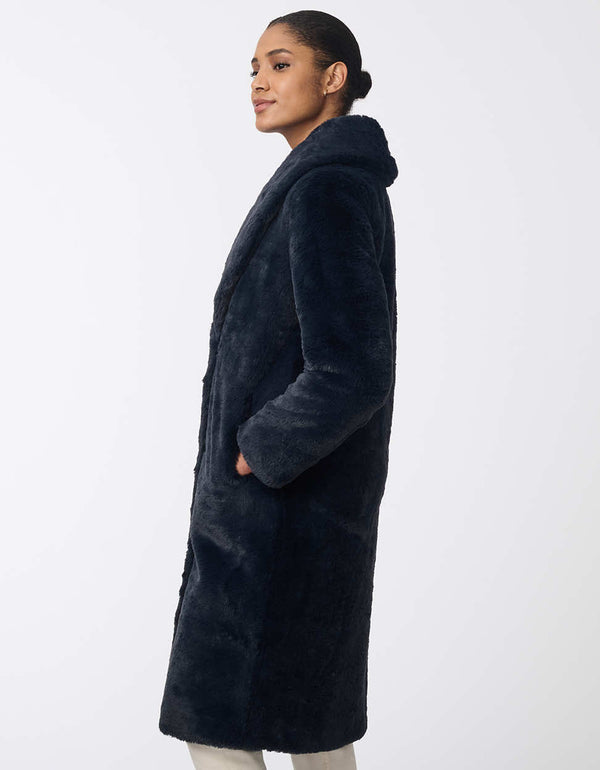 plush navy faux fur coat with a classic fit wide lapels and rich color blending elegance with everyday warmth