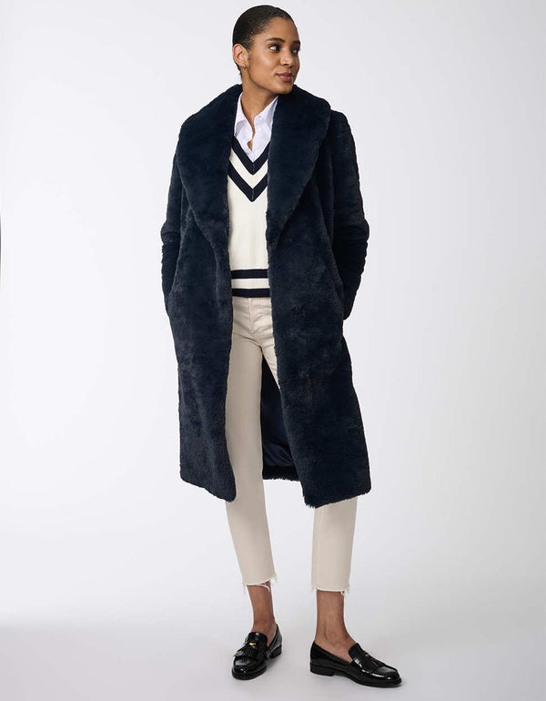 Women's long faux fur coat for an elevated look. Soft plush warmth for day or night.