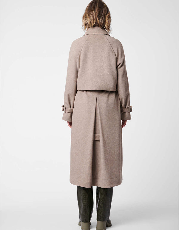 raglan cut wool coat in taupe for women with an extendable back for movement and adjustable cuff and belt