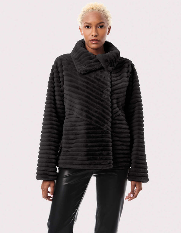 This women's faux-fur jacket is plush and warm for winter with the flattering angles and design lines.