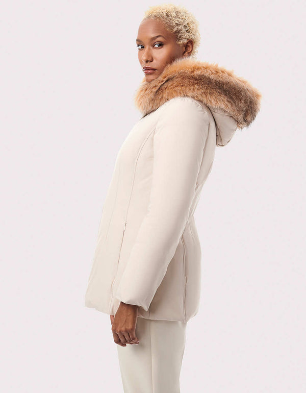 Shop Bernardo puffer jackets for womens winter sustainable style and this one pops with a plush vegan fur collar and hood