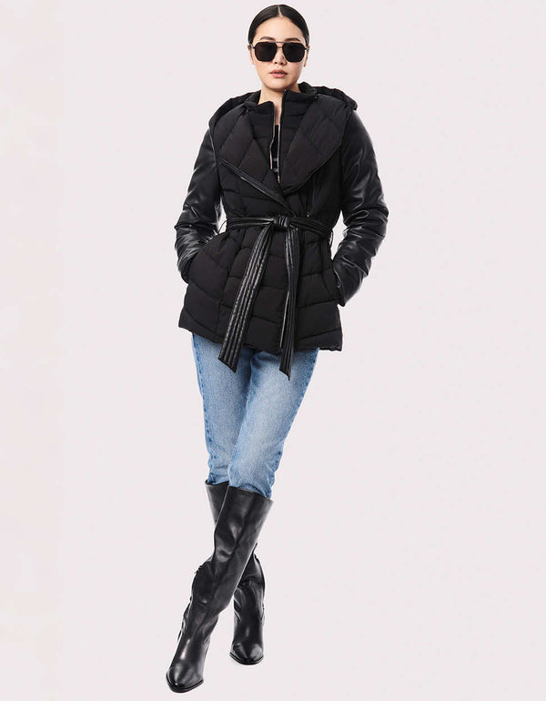 high quality and cruelty free black puffer jacket for women from a sustainable fashion brand in the United States