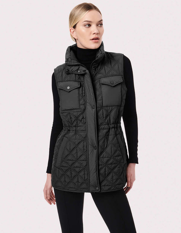 back to basics black quilted puffy vest for women with solid patch pockets and placket trim