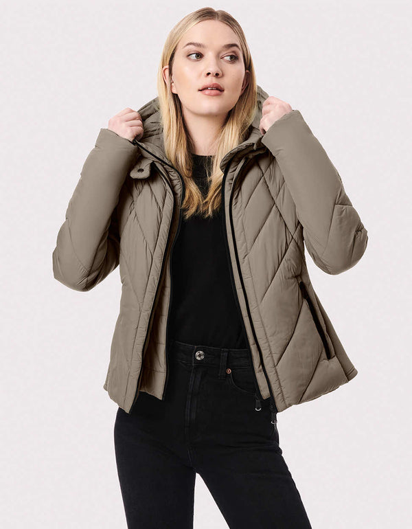 polyester jacket with black buttons stand collar and zip pockets that focus the attention on the bodys shape for a woman