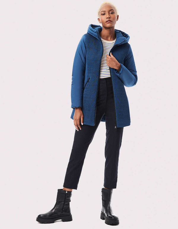 Shop women's puffer coats in walker lengths at Bernardo. This one has crinkled texture, smooth sleeves and sides, a two-way zipper and ample hood.