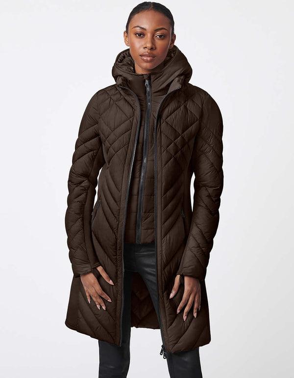 womens puffer walker with a mid length design removable hood and surprisingly light sustainable filler