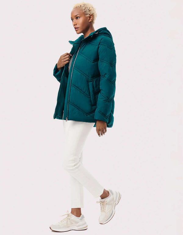 best affordable winter jackets for women in blue green color made by a sustainable online clothing store