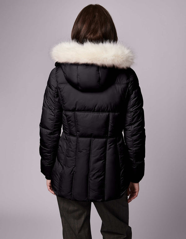 A women's winter puffer jacket has versatile style with a removable hood with faux-fur trim. Sustainable puffer made with recycled materials.