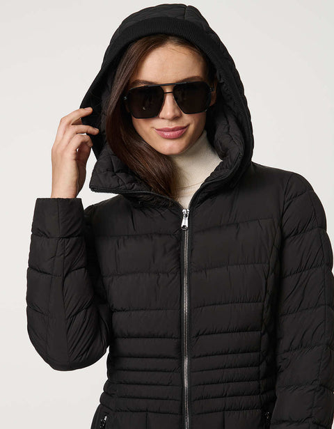 black long puffer coat with full zip up enclosure with quilted stitch design and a removable hood for women