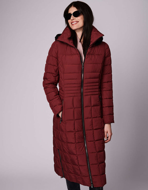 The quilted, long puffer coat for women has sustainable style with a shell, lining and Ecoplume™ insulation all made from recycled materials.