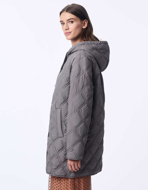 elongated thin puffer hooded jacket with adjustable drawstrings and two pockets for women in the fall