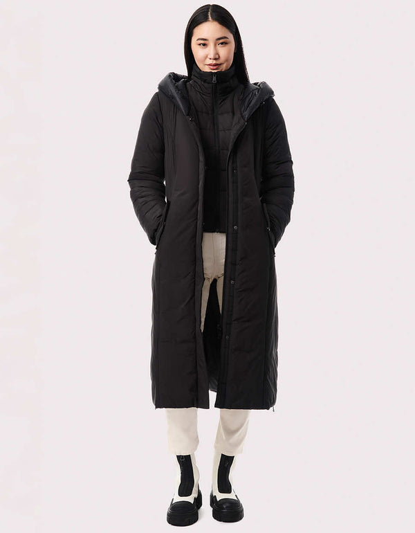 black winter puffer coat for women that is eco friendly full made from recycled materials in a classic knee length fit