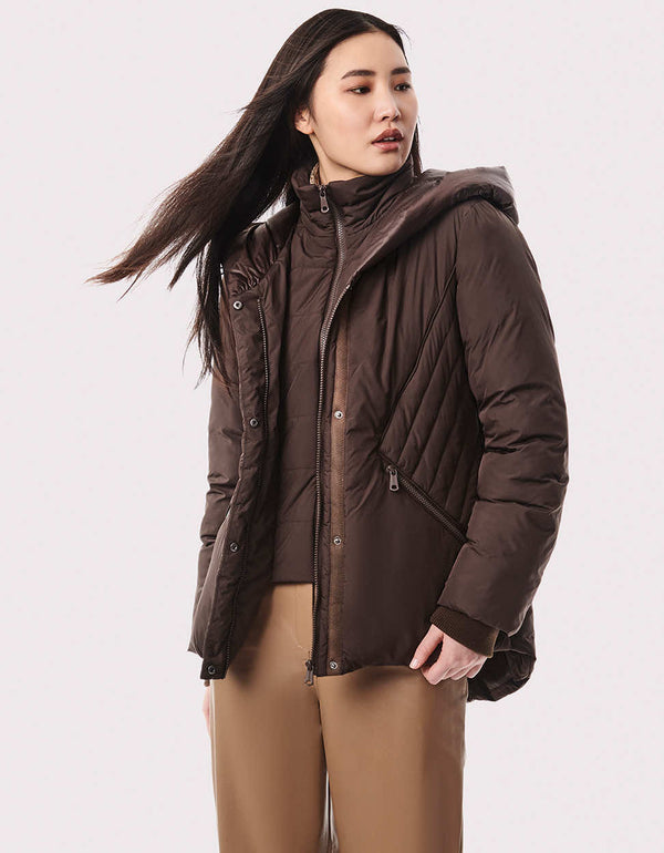 casual puffer jacket for women on sale with inner bib and ecoplume insulation made by a sustainable clothing brand in the US