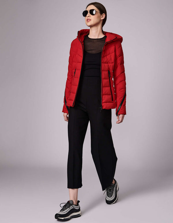 womens capsule 23 collection funnel quilted puffer jacket with extended zippers on the pockets and sleeves