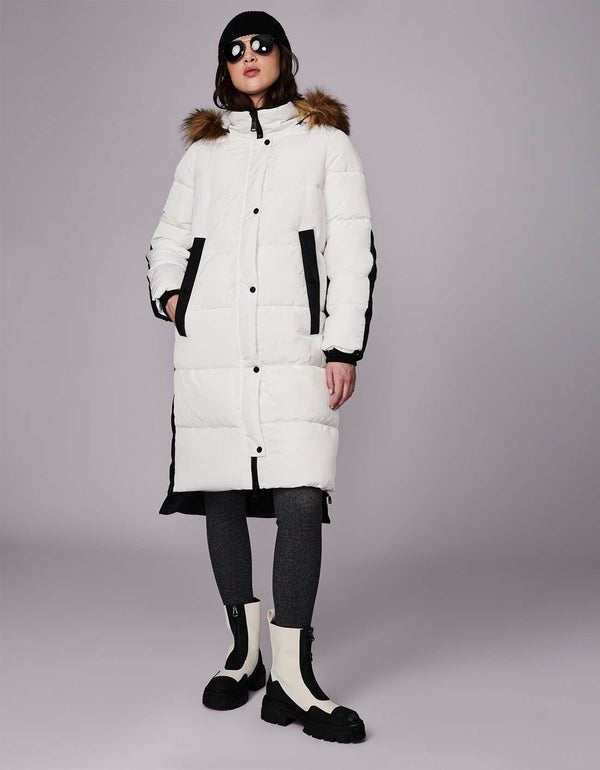 outdoorsy womens wool puffer coat with a vegan fur hood for extra warmth in the neck area